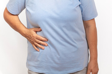 mature woman suffering from acute liver pain,white background.
