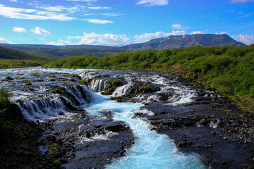 The beautiful blue water of Brúarfoss waterfall, Iceland