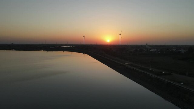 dam water aerial view taken from 300 meters above the surface. Amazing Aerial sunset view of Dam. 4k resolution.