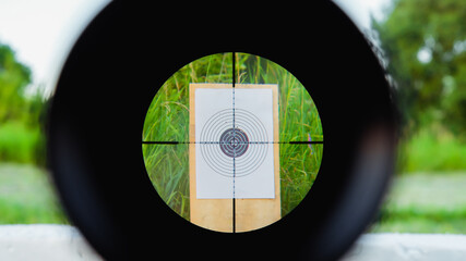 Sniper gun scope view, target