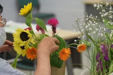 A scene of the flower arrangement class.