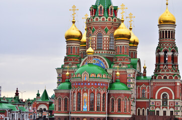 The golden domes of the Cathedral of the Epiphany close-up. Russia Yoshkar-Ola 01.05.2021. High quality photo