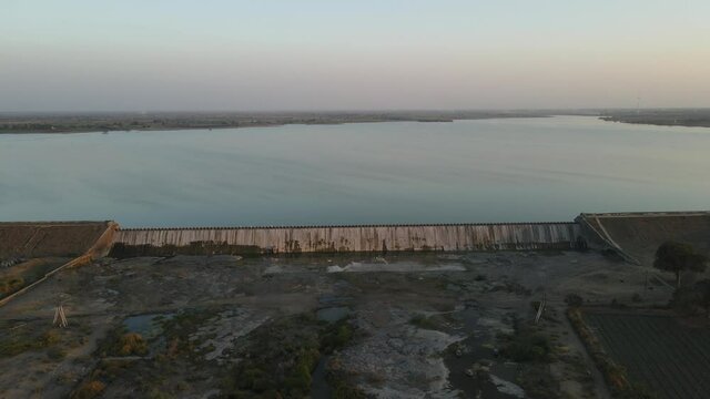 dam water aerial view taken from 300 meters above the surface. Amazing Aerial sunset view of Dam. 4k resolution.