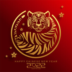 Chinese new year 2022 year of the tiger red and gold flower and asian elements paper cut with craft style on background.( translation : chinese new year 2022, year of tiger )