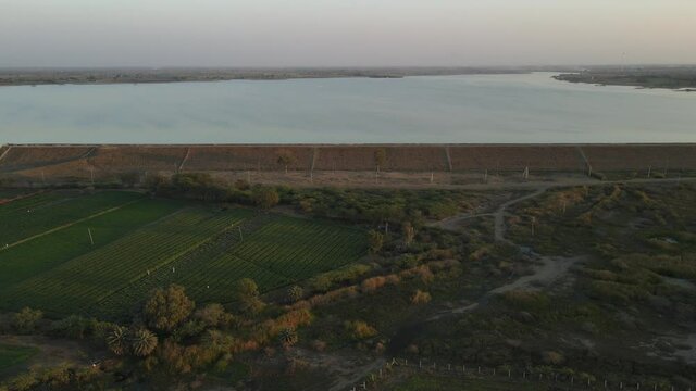 dam water aerial view taken from 300 meters above the surface. Amazing Aerial sunset view of Dam. 4k resolution.