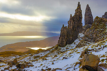 Isle of Skye, Scotland, UK, Old Man of Storr, at Sunrise Sunset, Ancient Natural Stone Monument with a touch of winter snow