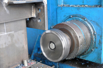 Metalworking process on a lathe. Frazing of metal structures.