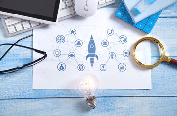 Rocket symbol, business icons and network. Business objects. Startup