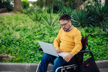 man with disabilities in wheelchair job business job