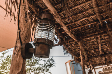 Ancient Arabic lamp in Heritage style village, Al Seef Dubai, located in Bur Dubai
