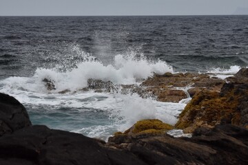 the sea on the coast with its waves, shapes and colors