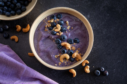 Keto Diet Healthy Fruit Smoothie Bowl, Top View, Dark Background