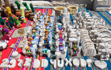 Llamas merchandising made of salt from a craftsman in Salar of Salinas Grandes in Argentine