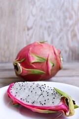 Dragon tropic health fruit on brown wood table background