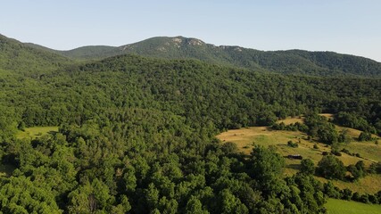 Fototapeta premium Scenic aerial overview of Shenandoah mountains and hills from above during sunset