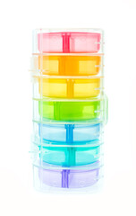 medicine daily pills in colorful box on white background