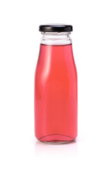 Sweet red soft drink in glass botle with cap isolated on white background with clipping path.