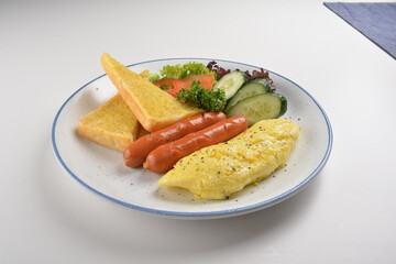 western big breakfast with butter toast, fried scramble egg, sausage, grill bacon, ham, omelette, bean and salad halal breakfast menu 