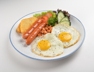 western big breakfast with butter toast, fried scramble egg, sausage, grill bacon, ham, omelette, bean and salad halal breakfast menu 