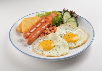 western big breakfast with butter toast, fried scramble egg, sausage, grill bacon, ham, omelette, bean and salad halal breakfast menu 