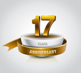 17 years golden anniversary logo celebration with ring and ribbon.