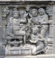 bas-relief panel in the 9th century mahayana buddhist temple of borobodur,  in magelang, java, indonesia    