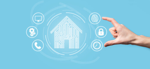 Hand hold house icon.Smart home controlled, intelligent house, and home automation app concept.Pcb...