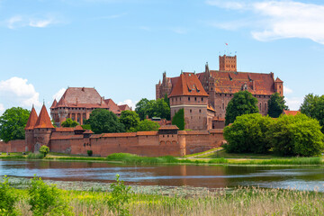 Naklejka na ściany i meble 13th century Malbork Castle, medieval Teutonic fortress on the Nogat River, Malbork, Poland