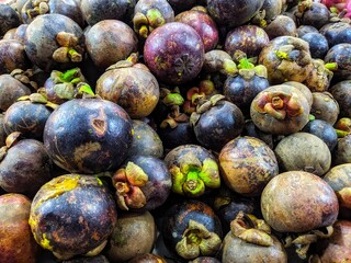 plums in a market
