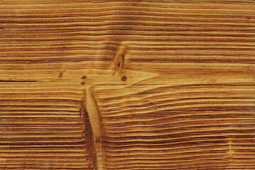 Pine wood texture coated with brown wood oil. 