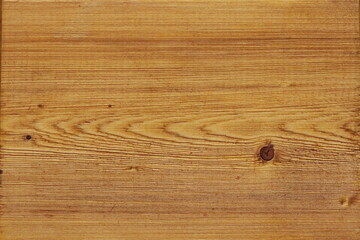 Fototapeta na wymiar Pine wood texture coated with brown wood oil. 