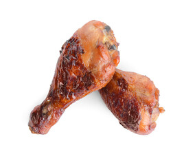 Roasted chicken legs on white background
