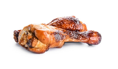 Roasted chicken legs on white background