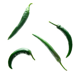 Flying chili peppers on white background