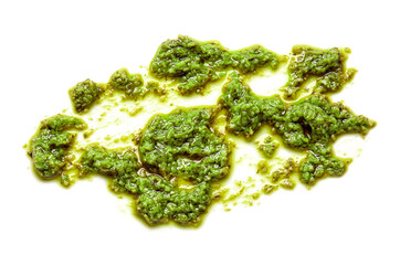 Smear of tasty pesto sauce on white background