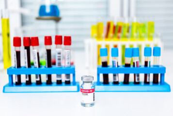 lab tubes and laboratory samples of coronavirus diagnostic blood test simulate vial of covid-19 vaccine in medical research laboratory or science lab study for preventive vaccination