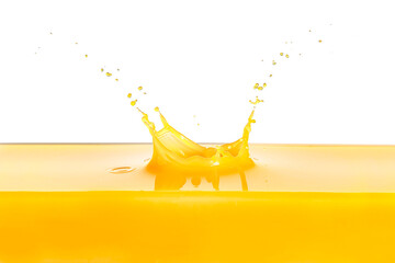 Splash of fresh orange juice on white background