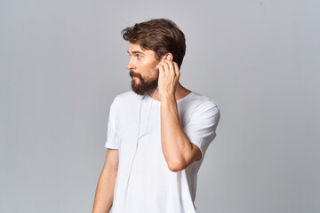 bearded man in white t-shirt emotions posing fun joy