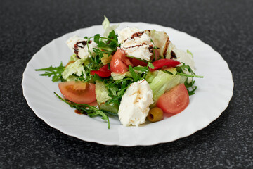 Salad with cheese and fresh vegetables. Greek salad.