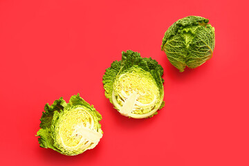 Fresh savoy cabbage on color background