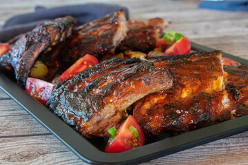 Spareribs on wooden table