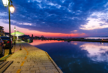 Beautiful sunset sky over seafront in Lefkada city,