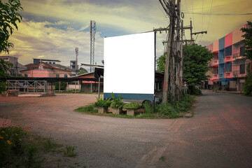 Fototapeta na wymiar White advertisement billboard beside of road.