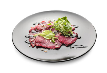 Plate with tasty veal carpaccio on white background