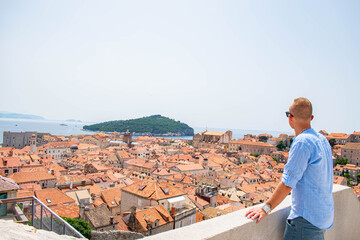 Visitors in Dubrovnik old city. Dubrovnik city walls, one of the world heritage
