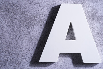 white alphabet a  on cement wall