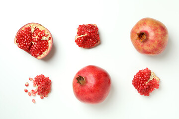 Ripe pomegranate on white background, top view