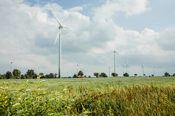 Wind turbines in the field. Renewable energy from wind power in Germany 