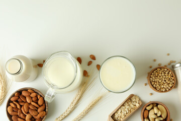 Obraz na płótnie Canvas Concept of vegan milk on white background, top view