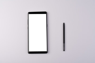 smartphone with blank white screen and black stylus for writing isolated on white background. 